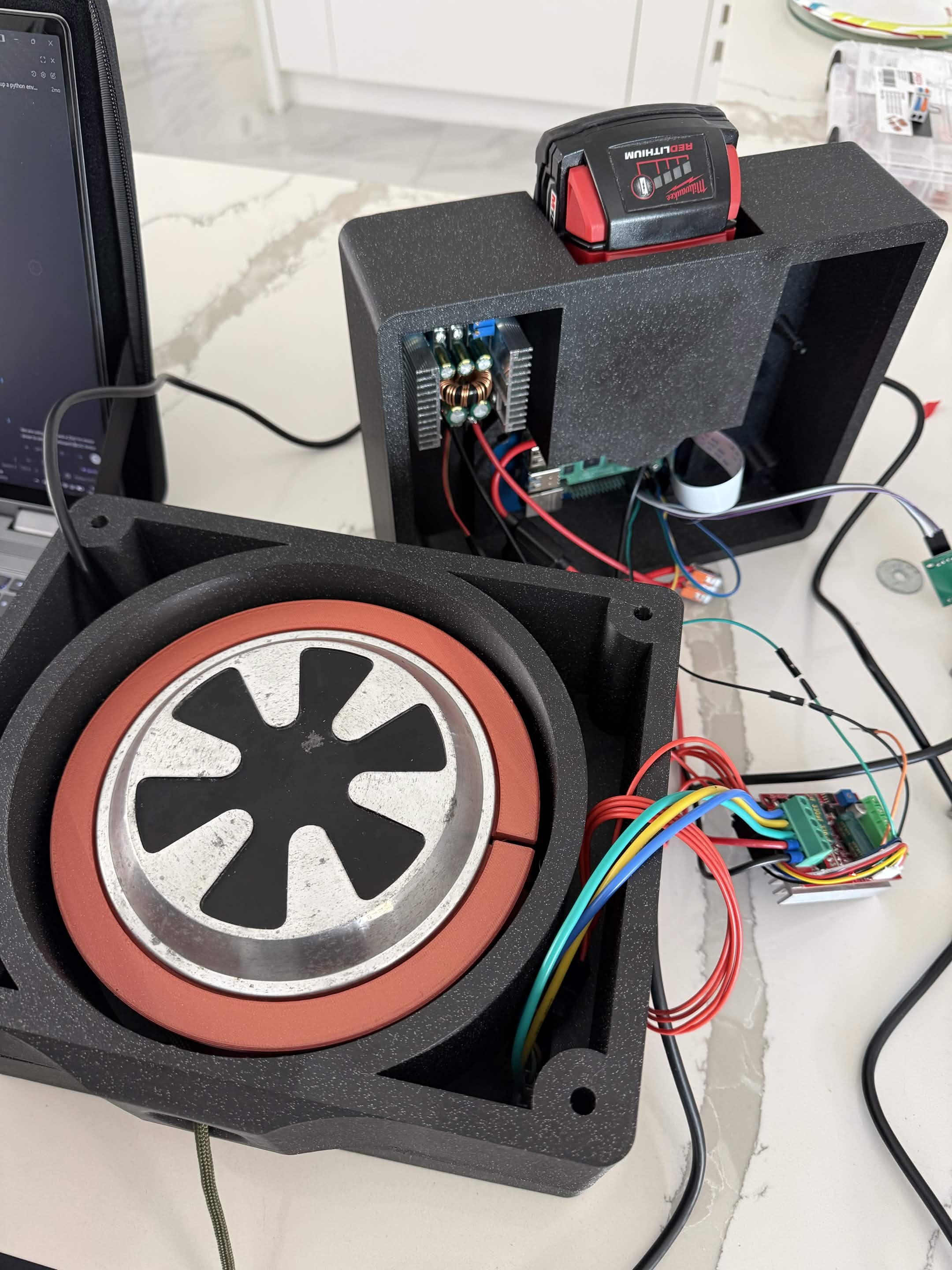 Samson Fit flywheel with red accent ring and electronics visible