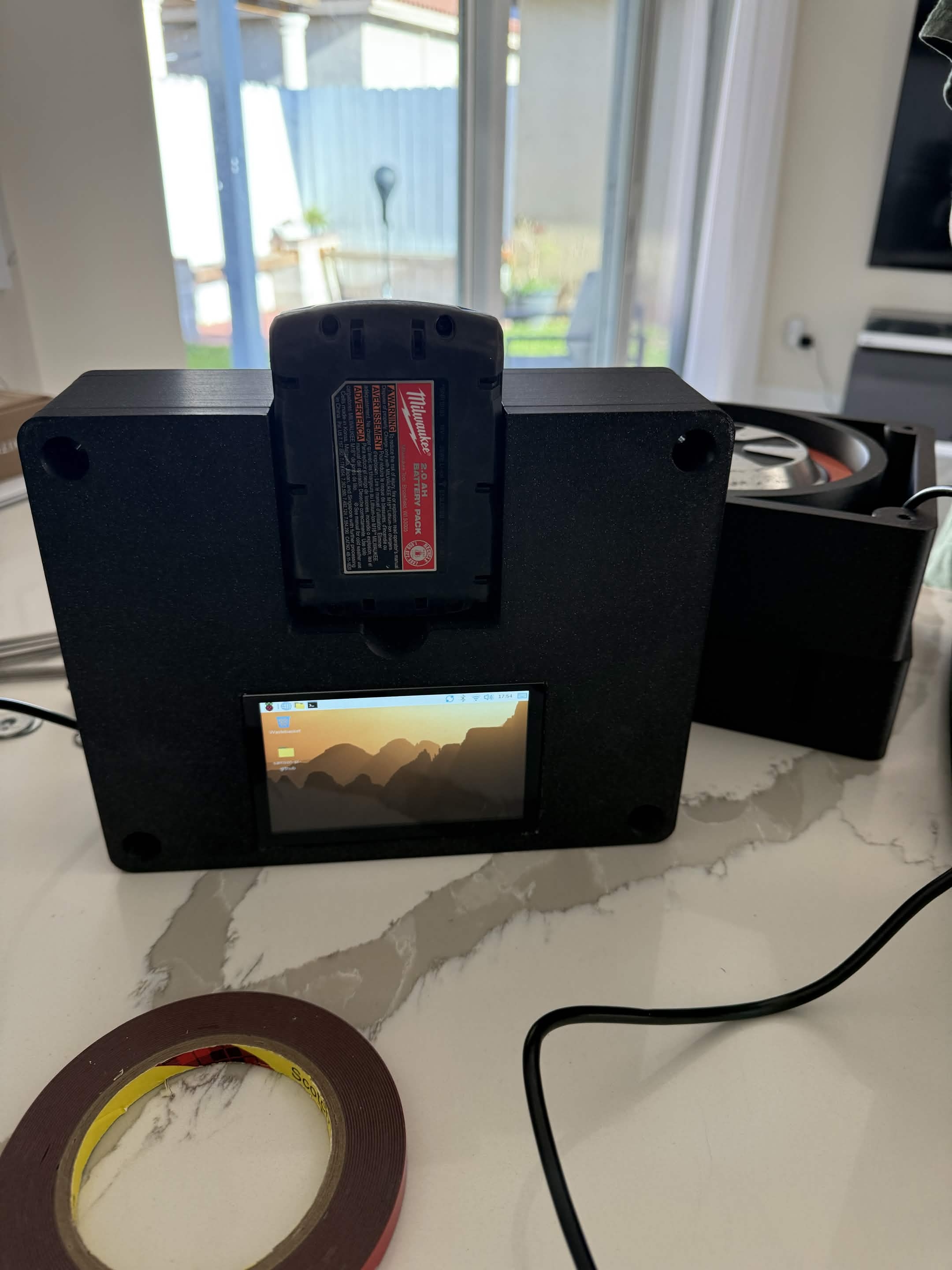 Samson Fit working prototype — front view with Milwaukee RedLithium battery and touchscreen